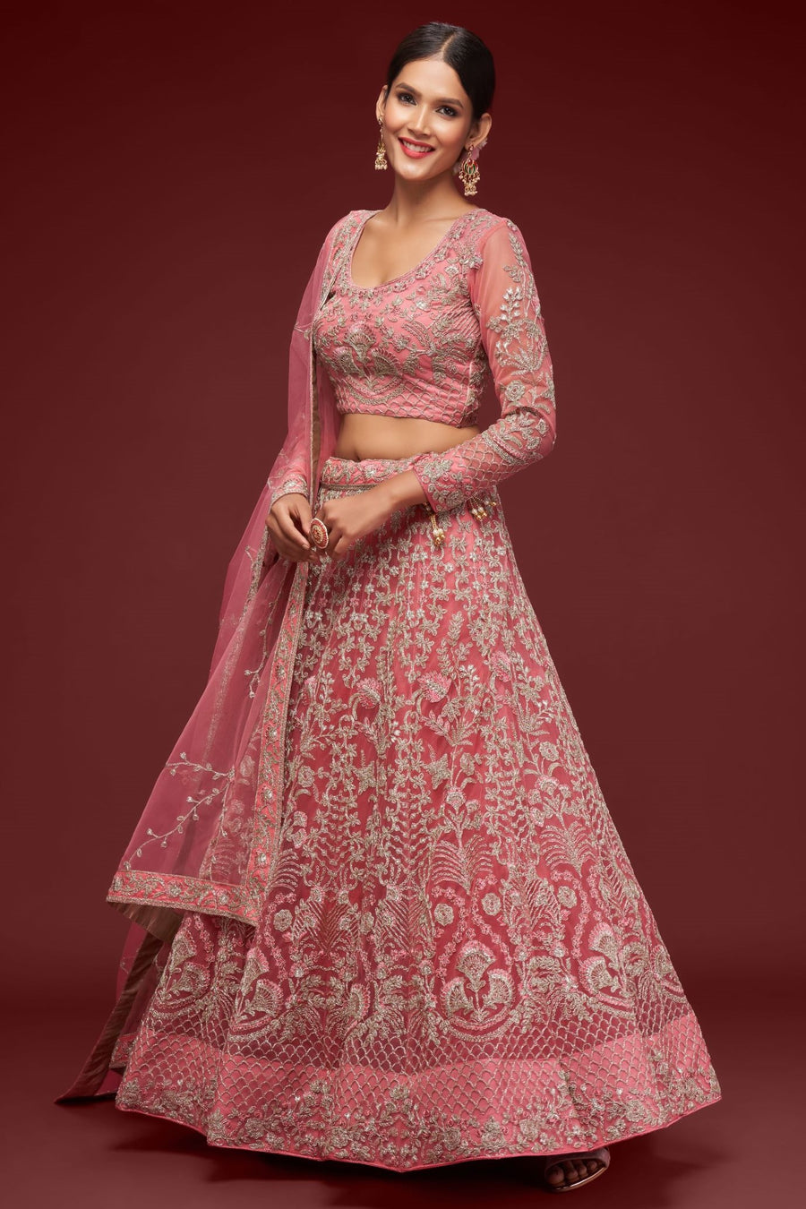 Rani Net Pastel Lehenga Choli with Zari and Dori Work
