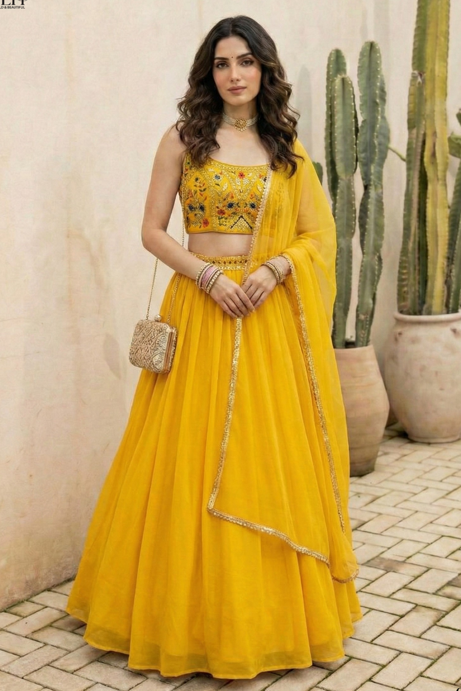 Yellow Georgette Sleeveless Mirror Work Lehenga Choli with Embroidery