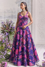 Blue reception lehenga styled with a sequin clutch bag for a wedding guest look.