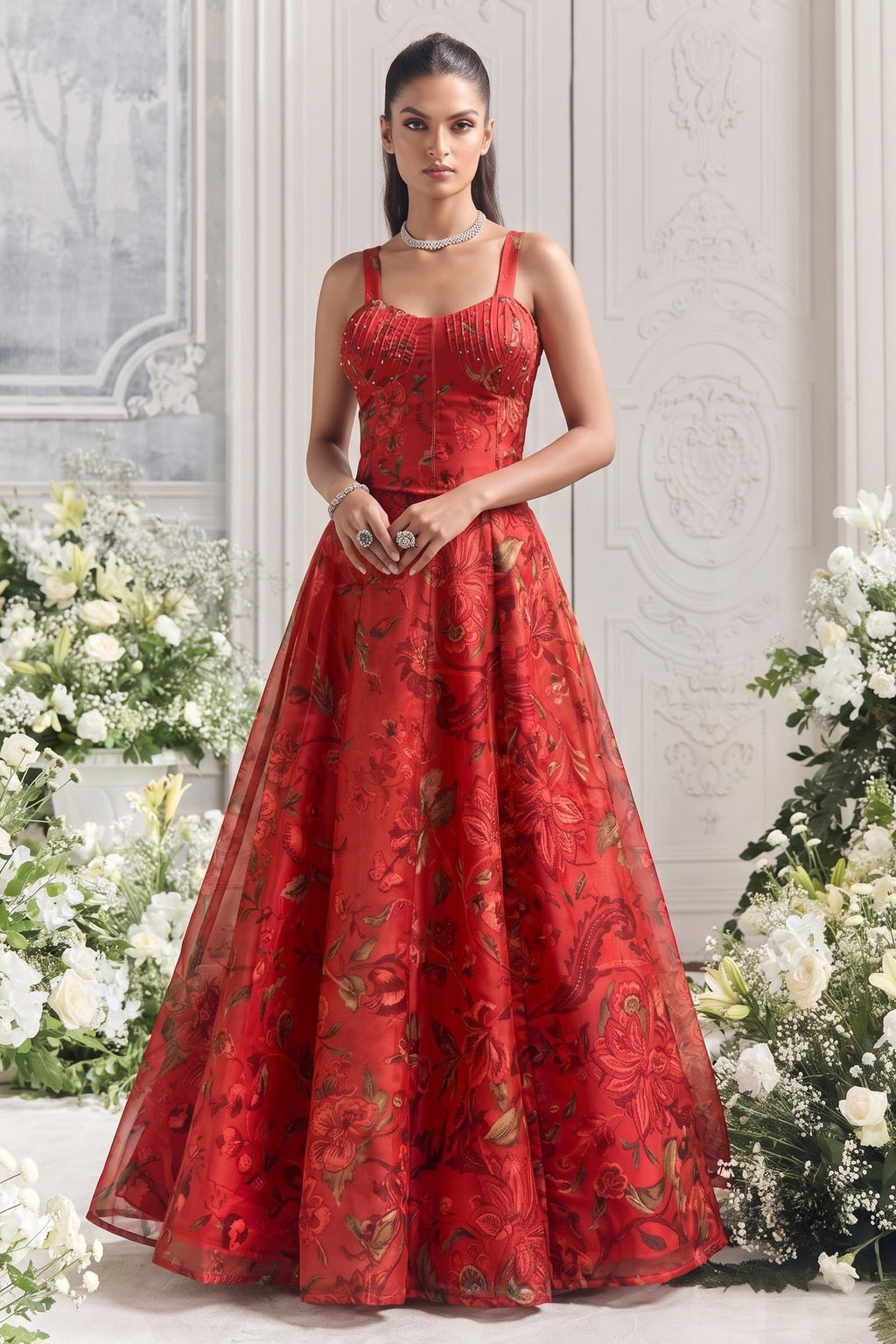 Red party wear lehenga choli styled for wedding and marriage reception celebrations.