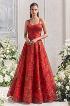 Red party wear lehenga choli styled for wedding and marriage reception celebrations.