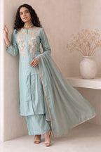 Full-length front view of a light cyan festive wear for women kurta set, an A-line kurta with ankle-length pants and tabby organza dupatta.