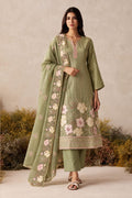 Woman wearing a sage green kurta for women in shimmer silk with floral thread embroidery, santoon pant and chiffon dupatta, full-length front view.