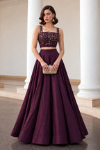 Burgundy wedding lehenga with sequins embroidery work on soft silk, shown in a full front view of the lehenga and sleeveless choli.