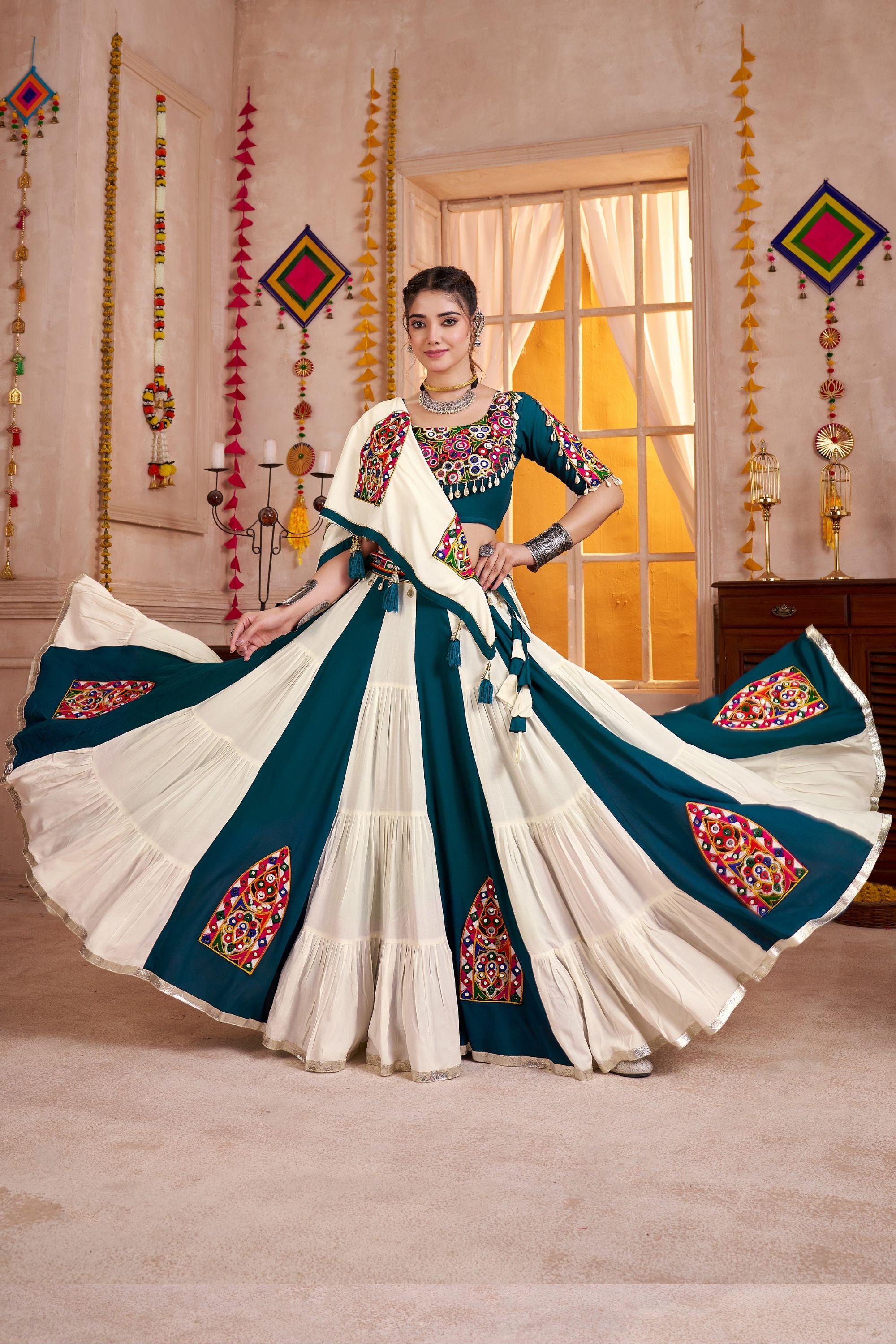 Woman in a traditional embroidered saree with a decorative background