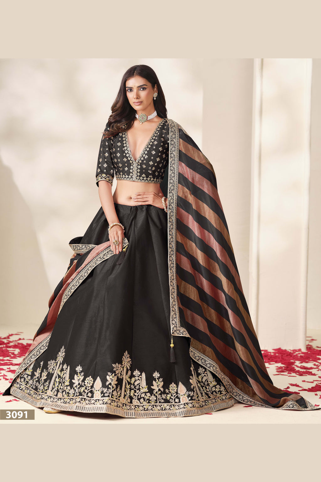 Black sequin lehenga, close-up of the blouse and choli embroidery detailing, featuring thread and sequins embroidery work on art silk with viscose dupatta.