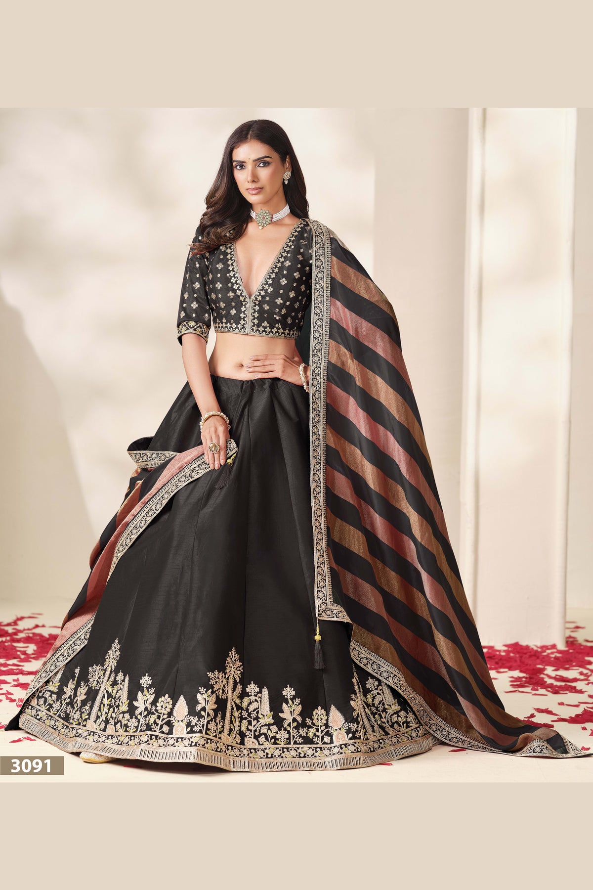 Black sequin lehenga, close-up of the blouse and choli embroidery detailing, featuring thread and sequins embroidery work on art silk with viscose dupatta.