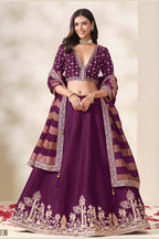 Wine Purple indian wedding lehenga, shown in a three-quarter front view, featuring thread and sequins embroidery work on art silk with viscose dupatta.