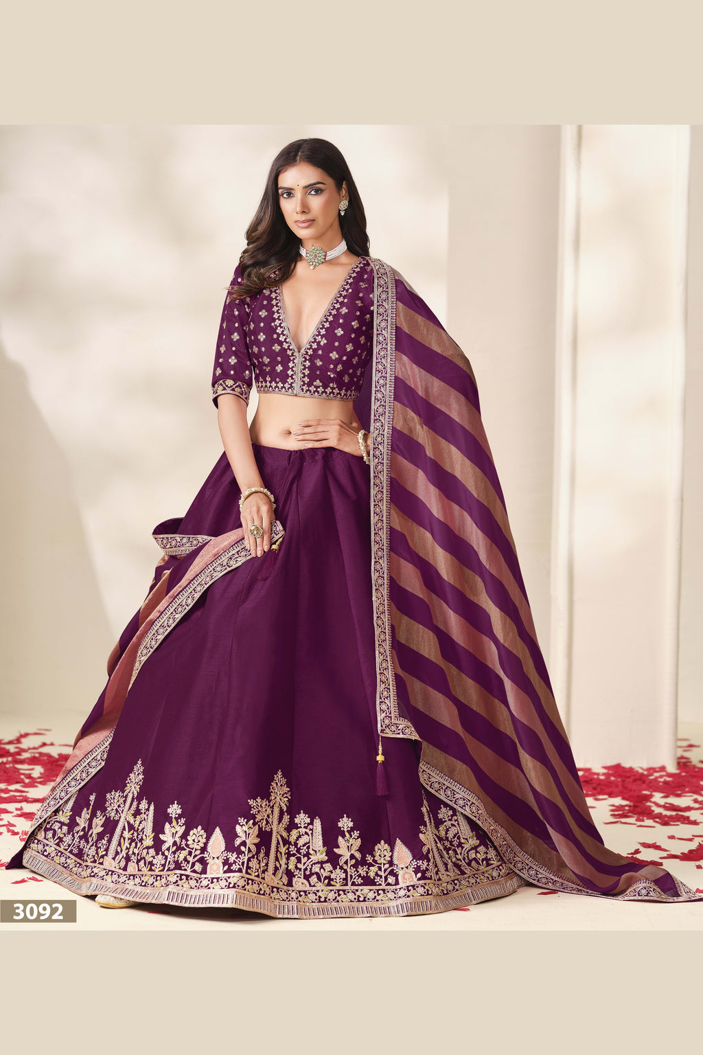 Wine Purple embroidered lehenga, close-up of the blouse and choli embroidery detailing, featuring thread and sequins embroidery work on art silk with viscose dupatta.