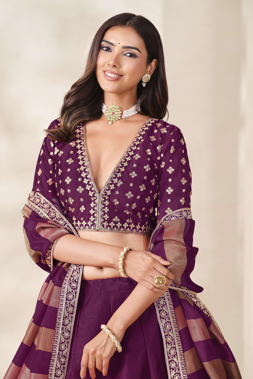 Wine Purple indian wedding lehenga, close-up of the lehenga skirt embroidery and sequin work, featuring thread and sequins embroidery work on art silk with viscose dupatta.