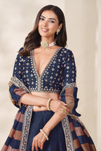 Navy Blue bridesmaid lehenga, close-up of the lehenga skirt embroidery and sequin work, featuring thread and sequins embroidery work on art silk with viscose dupatta.