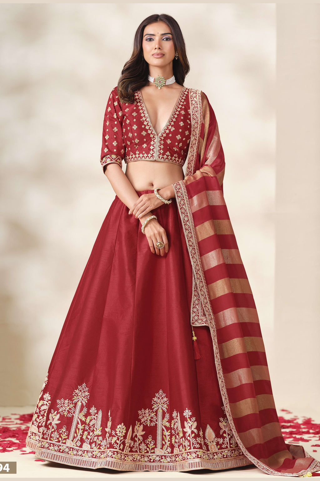 Red lehenga choli for wedding, shown in a full front view, featuring thread and sequins embroidery work on art silk with viscose dupatta.