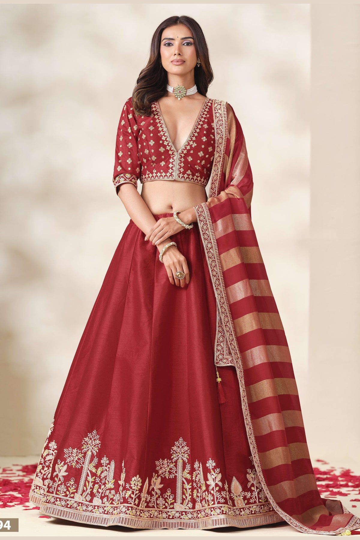Red lehenga choli for wedding, shown in a full front view, featuring thread and sequins embroidery work on art silk with viscose dupatta.