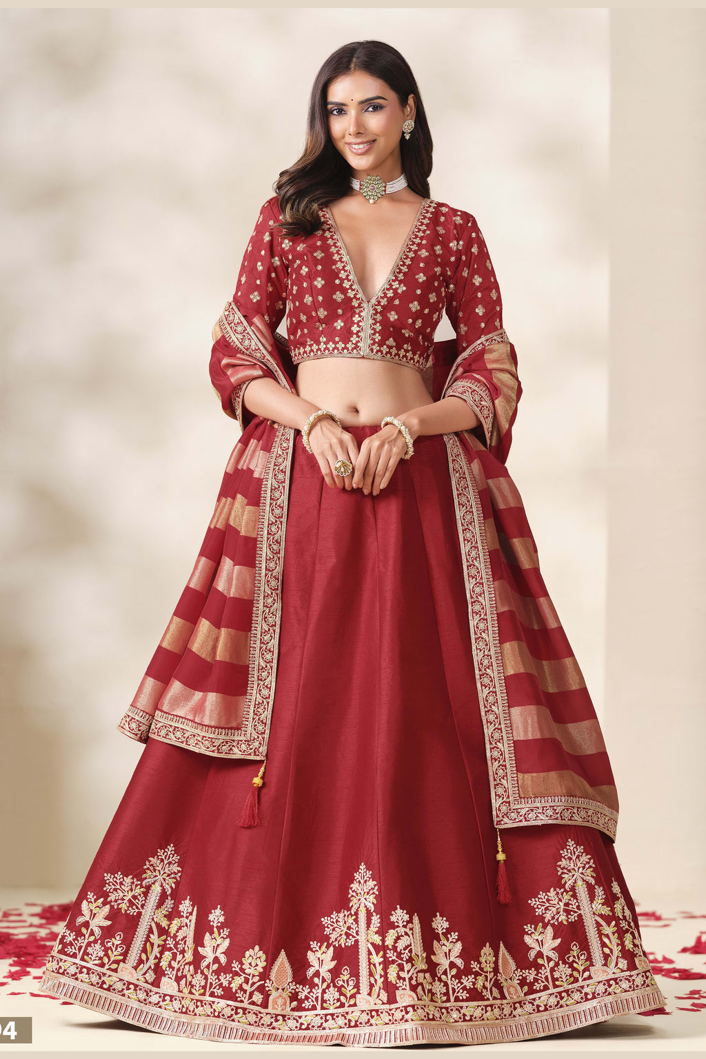 Red lehenga for sangeet, shown in a three-quarter front view, featuring thread and sequins embroidery work on art silk with viscose dupatta.