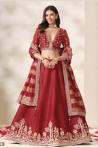 Red lehenga for sangeet, shown in a three-quarter front view, featuring thread and sequins embroidery work on art silk with viscose dupatta.