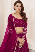 Dark Pink Georgette Embroidered Lehenga with Zari and Sequins Work