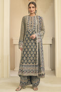 Another full-length front view of a greenish grey indian wedding guest dresses style plazo suit in crepe silk with hand aari work and gota patti work.