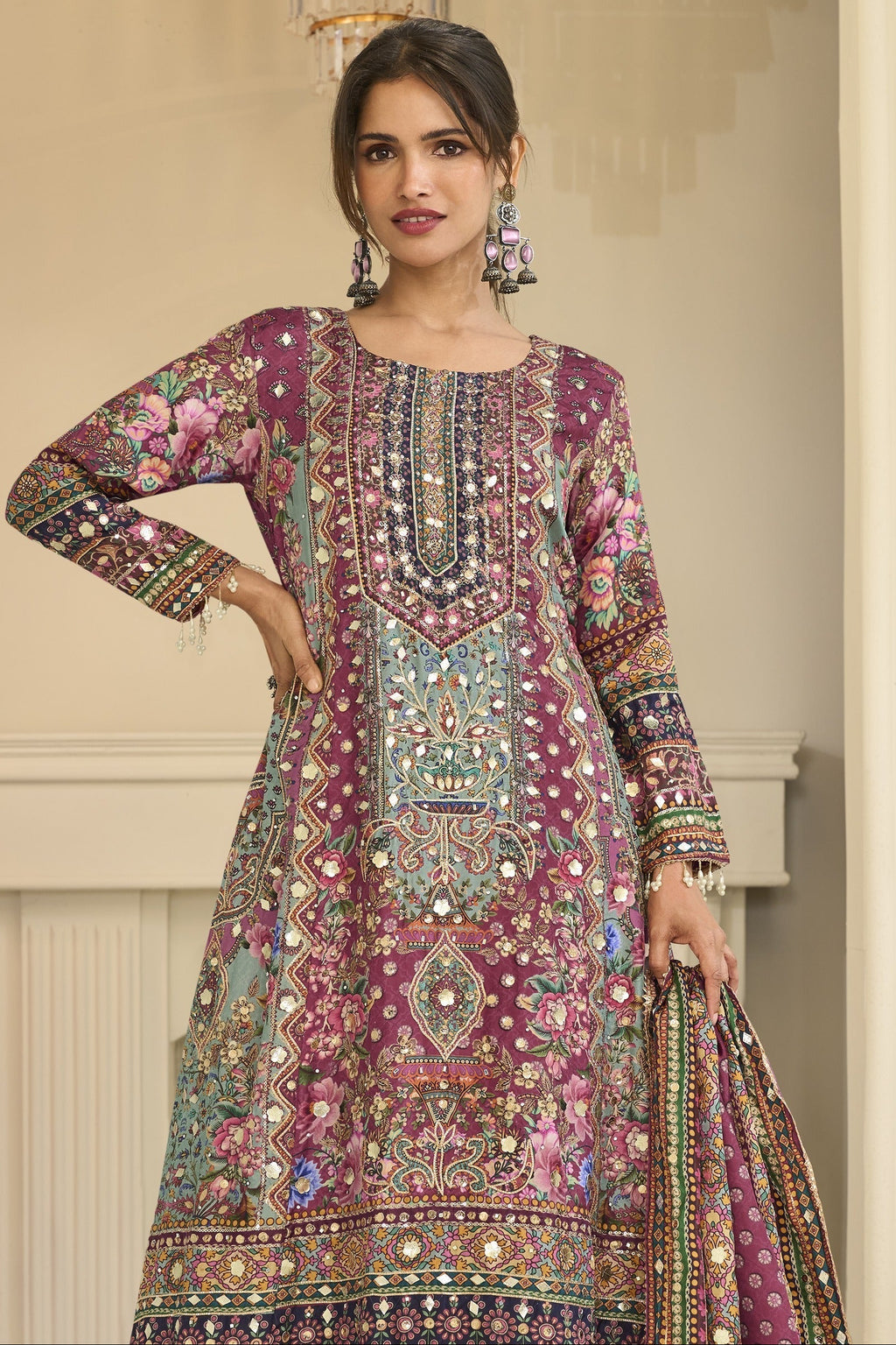 Upper-body view of maroon outfits for eid style plazo suit in crepe silk with hand aari work and gota patti work on the neckline and three-quarter sleeves.