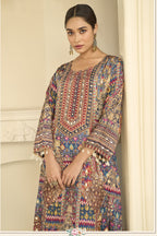 Close-up of a navy blue indian wedding guest dresses style plazo suit bodice in crepe silk with hand aari work and gota patti work on the neckline and sleeves.