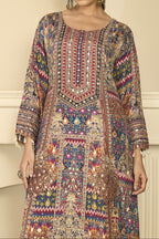 Upper-body view of navy blue mehndi outfits style plazo suit in crepe silk with hand aari work and gota patti work on the neckline and three-quarter sleeves.