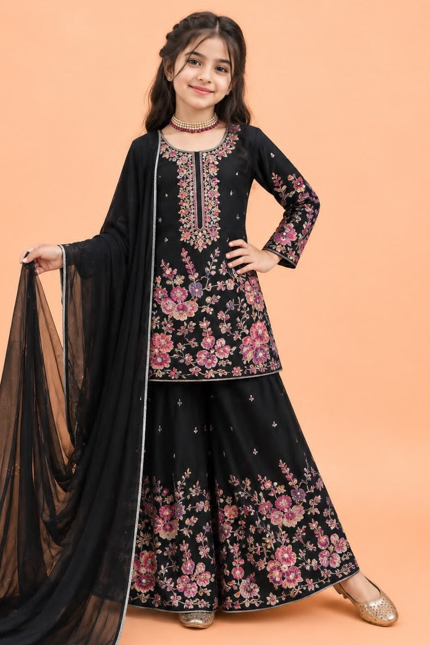 Black indian kidswear girls plazo suit, full front view on model, with pink floral sequins and thread work on chinon silk.