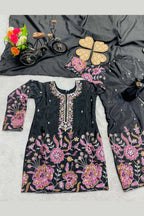 Flat lay of black indian kidswear plazo set, kameez with floral sequins and thread embroidery on chinon silk fabric.