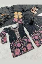Black kids plazo suit flat lay detail, close-up of pink floral sequin and thread work on the chinon silk kameez.