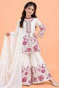 Off White childrens indian outfits girls plazo suit, full front view on model, with pink floral sequins and thread work.