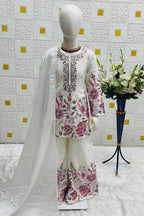 Off White ethnic kidswear kameez plazo set on mannequin, front view showing sequin embroidered chinon silk kameez.