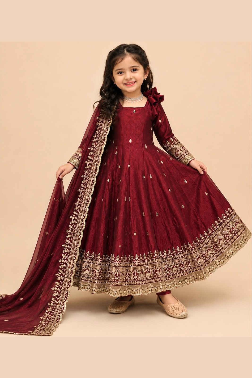 Maroon kids anarkali suit on mannequin, front view with embroidered fendy silk dupatta draped.