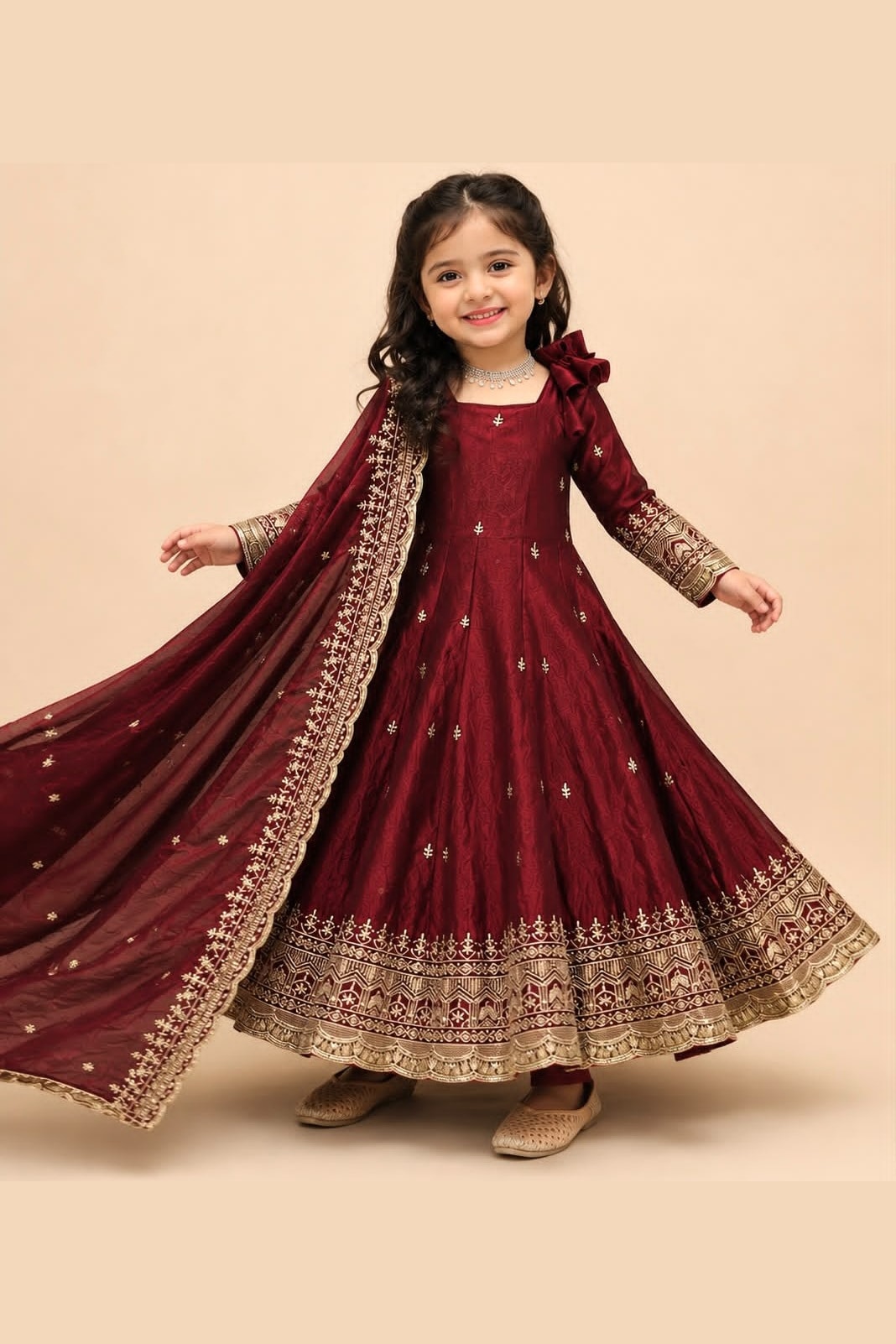 Maroon indian kidswear girls anarkali suit, full front view on model, with sequins and zari work on fendy silk.