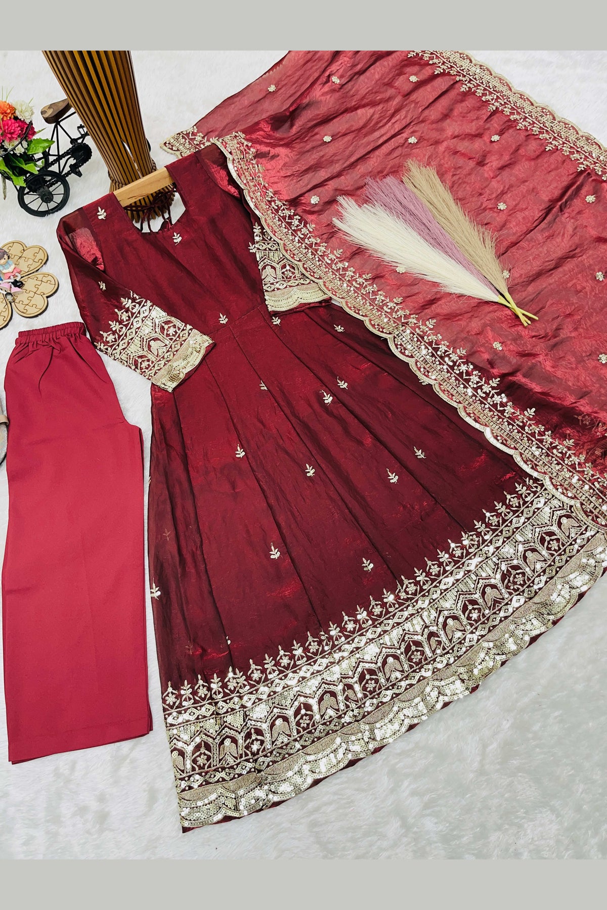 Maroon indian kidswear anarkali with cotton pant, full length front view on model with fendy silk dupatta.