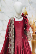 Maroon ethnic kidswear anarkali flat lay, complete set with cotton pant and fendy silk dupatta.