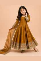 Mustard ethnic kidswear anarkali flat lay, full set with cotton pant and fendy silk dupatta.