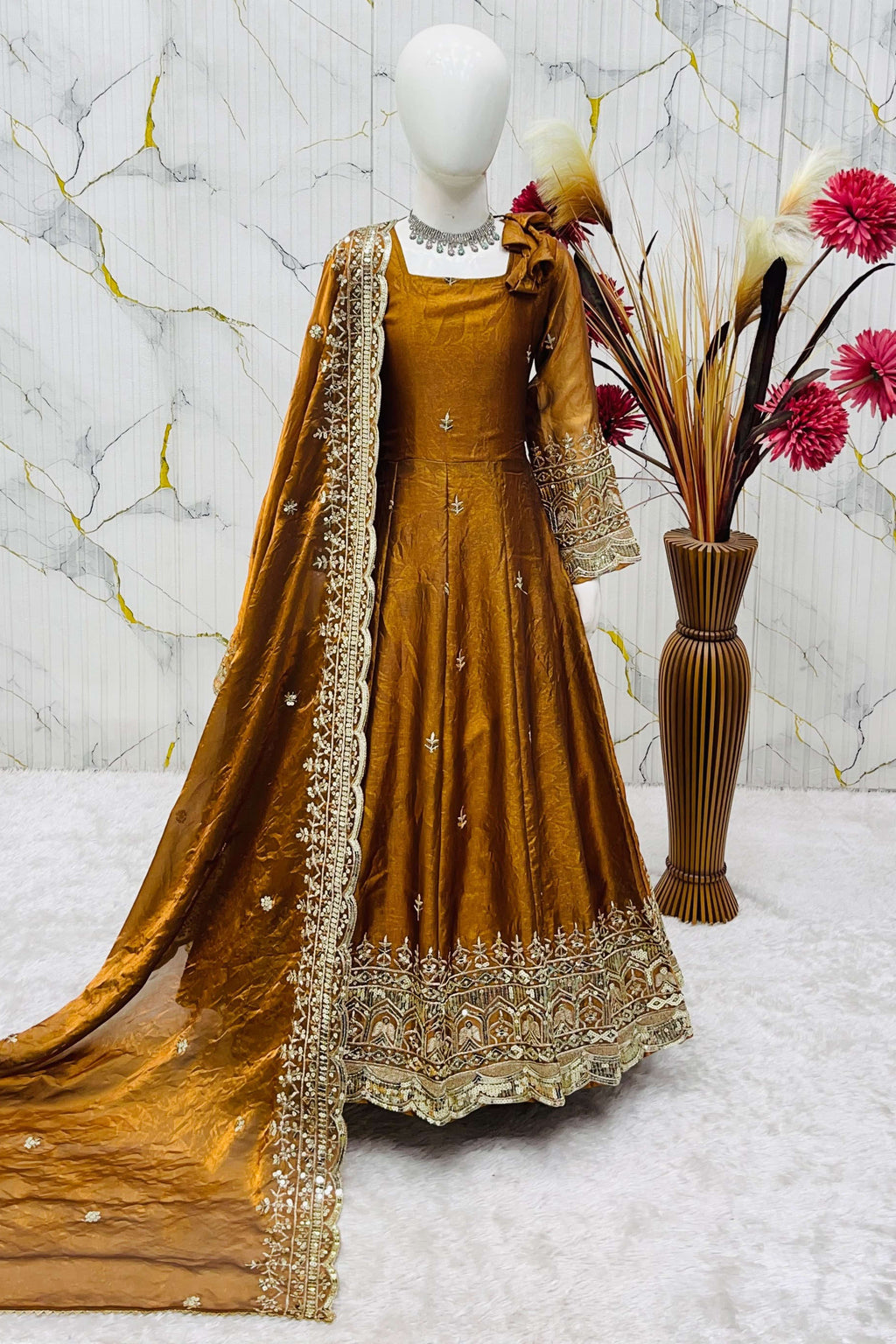 Mustard ethnic kidswear anarkali set for girls, three-quarter front view, zari embroidered neckline on fendy silk.