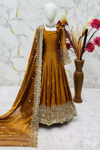 Mustard ethnic kidswear anarkali set for girls, three-quarter front view, zari embroidered neckline on fendy silk.