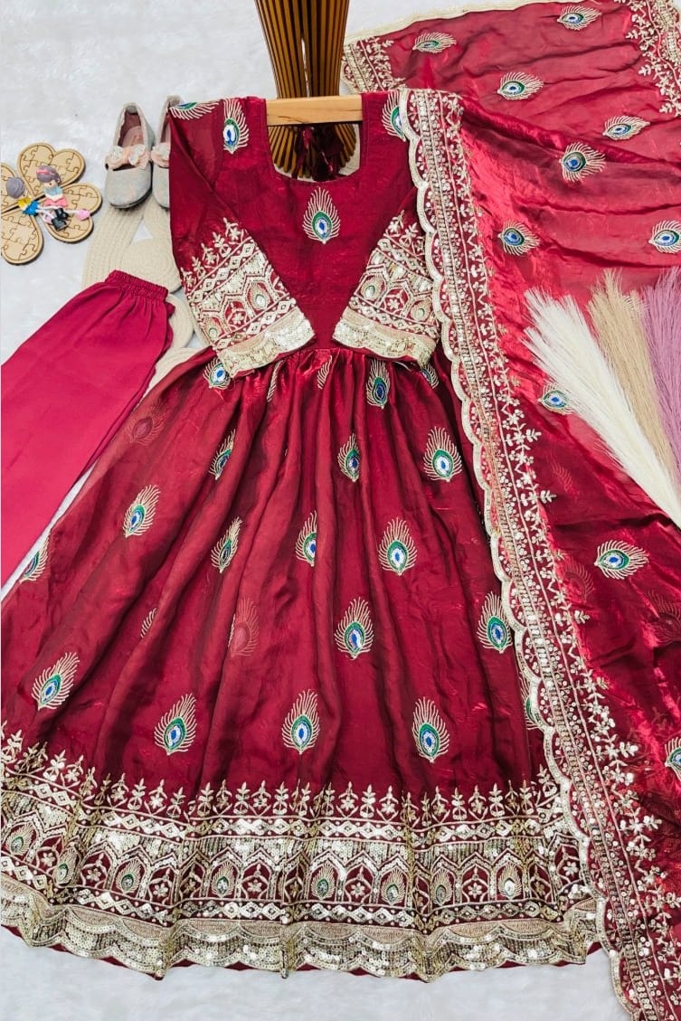 Red ethnic kidswear girls anarkali set flat lay with cotton pant and embroidered fendy silk dupatta, full set view.