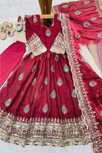 Red ethnic kidswear girls anarkali set flat lay with cotton pant and embroidered fendy silk dupatta, full set view.