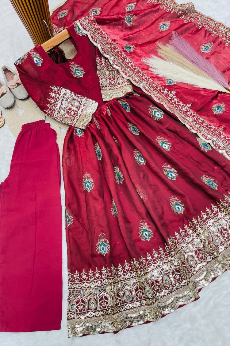Red childrens indian costume anarkali set flat lay with cotton pant and embroidered dupatta, complete view of the set.