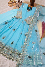 Sky blue ethnic kidswear girls anarkali set flat lay, alternate angle showing the full embroidered three-piece set.