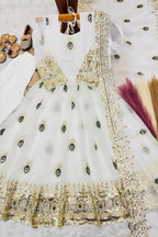 White childrens indian costume anarkali set for girls flat lay showing the embroidered top, cotton pant and fendy silk dupatta.