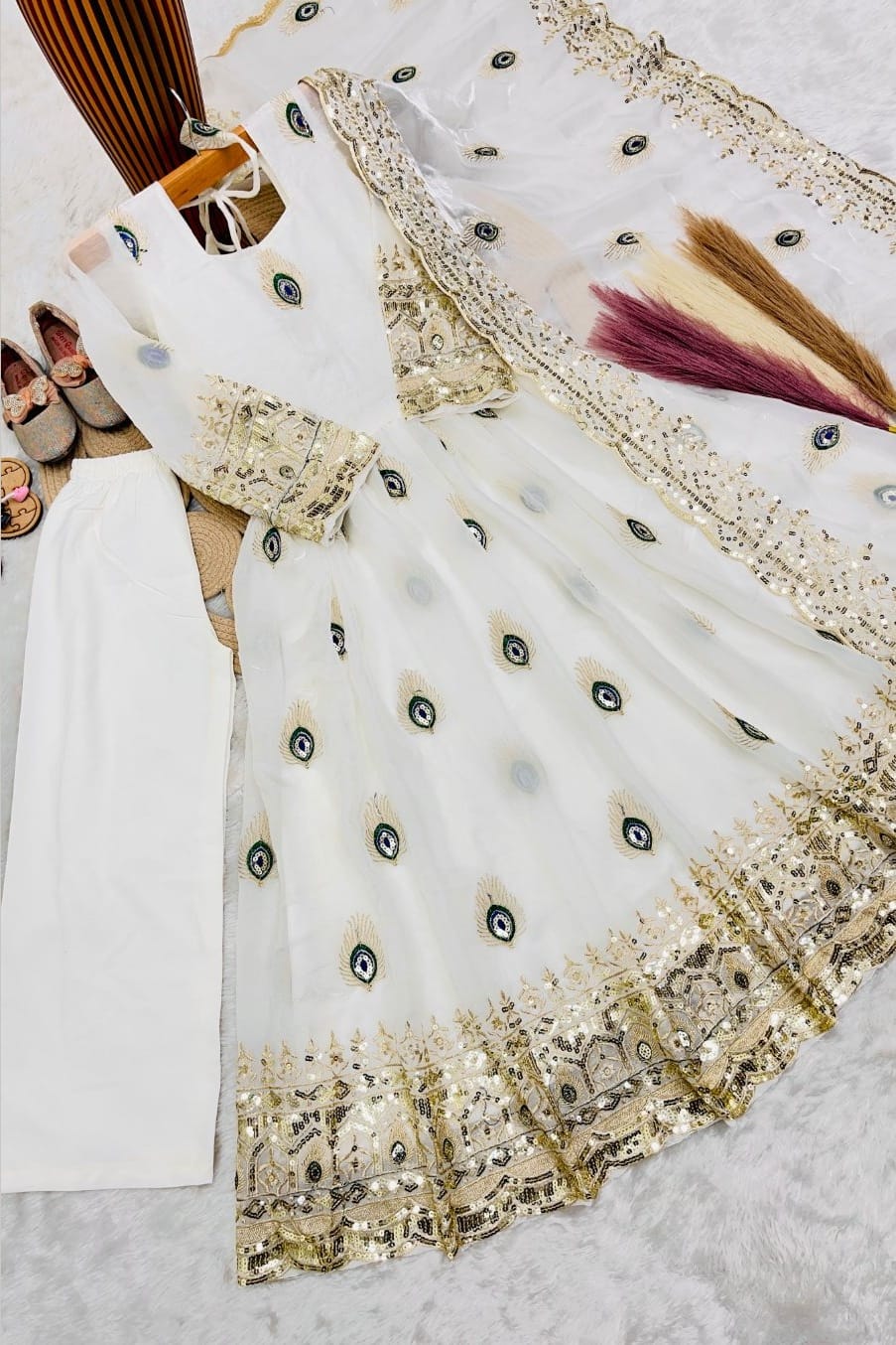 White indian kidswear girls anarkali set flat lay with cotton pant, alternate angle showing the full three-piece set.