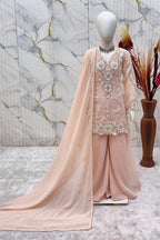 Peach ethnic kidswear kurta set for girls, three-quarter view, embroidered neckline on georgette.