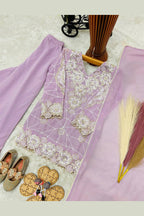 Light purple kids palazzo suit kurta on model, side view with sequin and thread detailing.