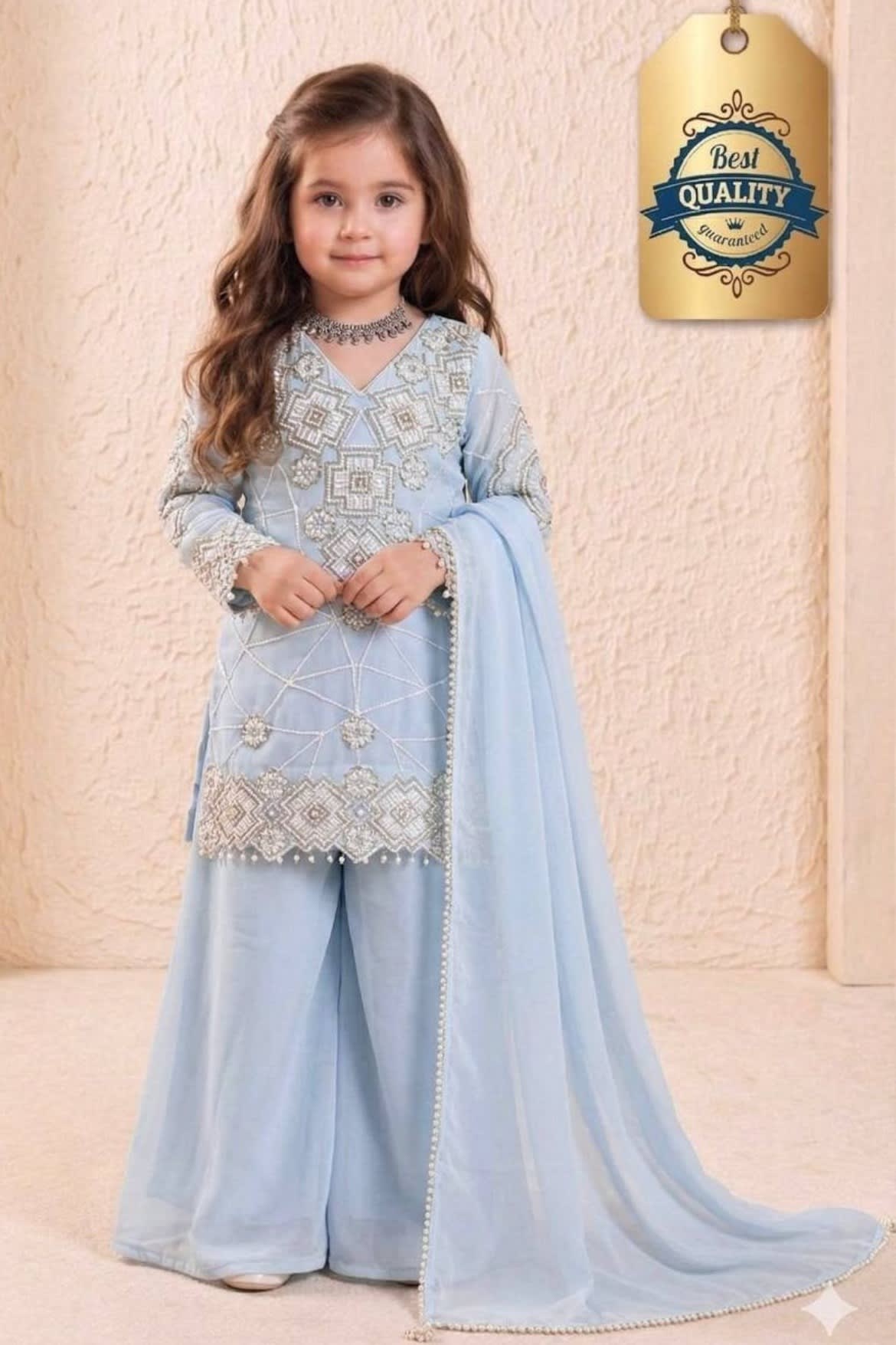 Light blue indian kidswear girls kurta palazzo set, full front view on model, sequins and thread work on georgette.