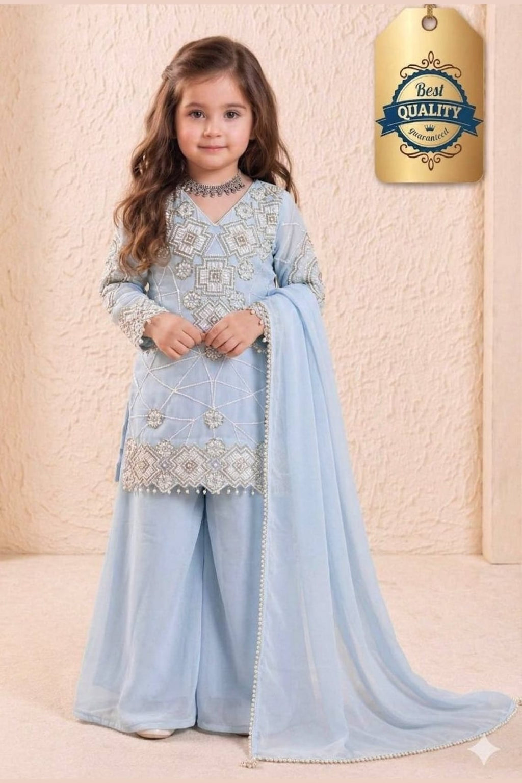 Light blue ethnic kidswear kurta for girls, three-quarter front view, embroidered neckline detail.