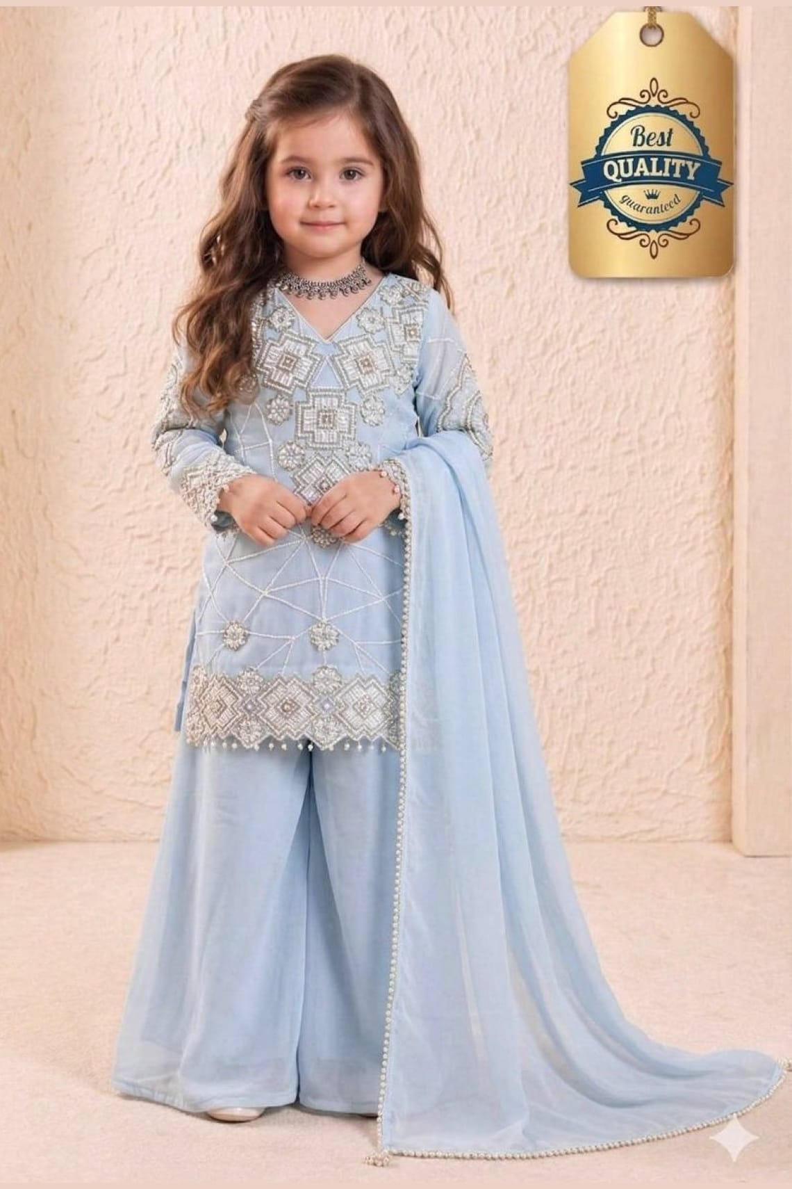 Light blue ethnic kidswear kurta for girls, three-quarter front view, embroidered neckline detail.