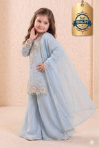 Light blue girls georgette kurta on model, side view displaying sequin and thread work.