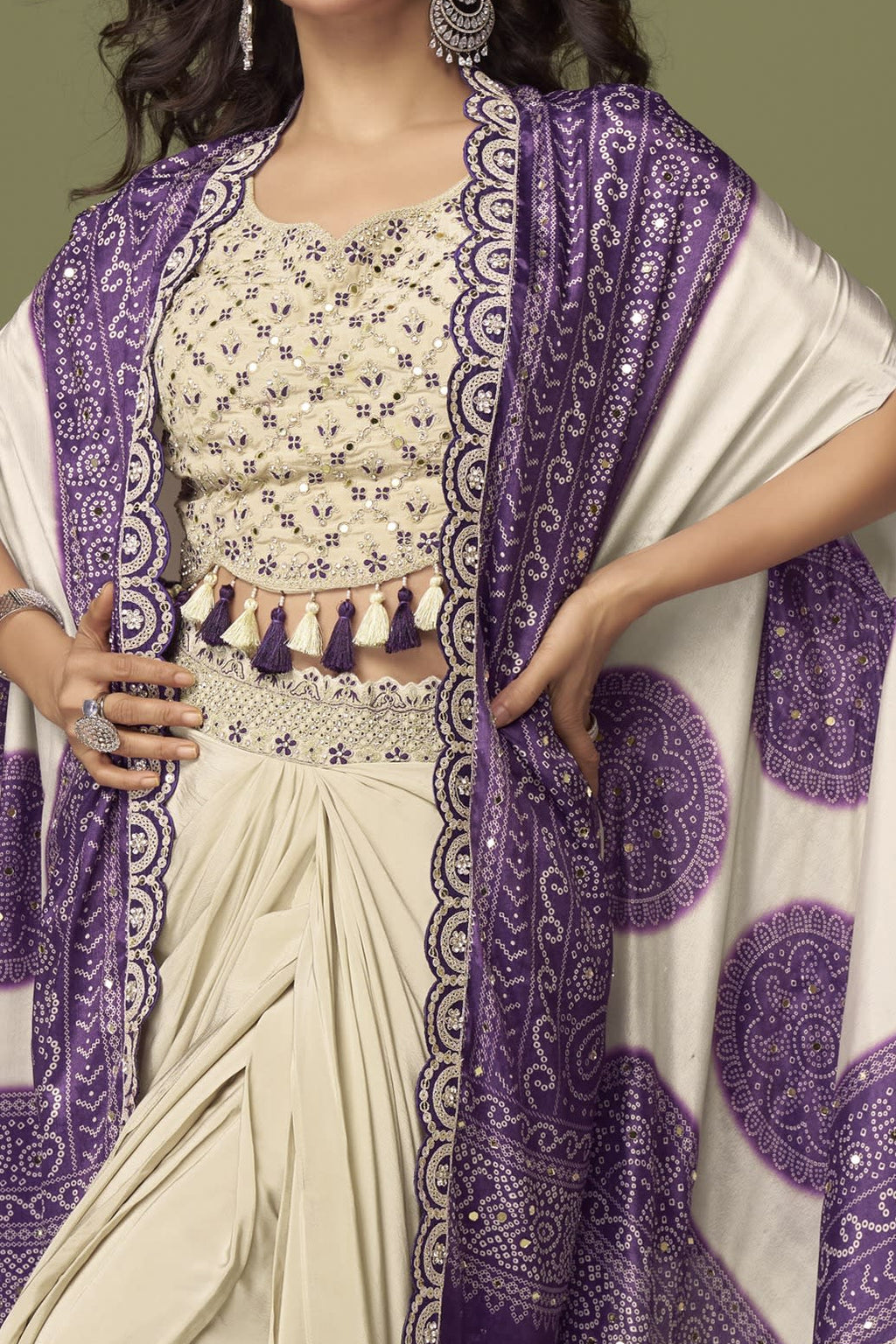 front view of a purple sangeet outfits for women plazo and blouse set in chinon silk with embroidery and print work.
