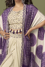 front view of a purple sangeet outfits for women plazo and blouse set in chinon silk with embroidery and print work.